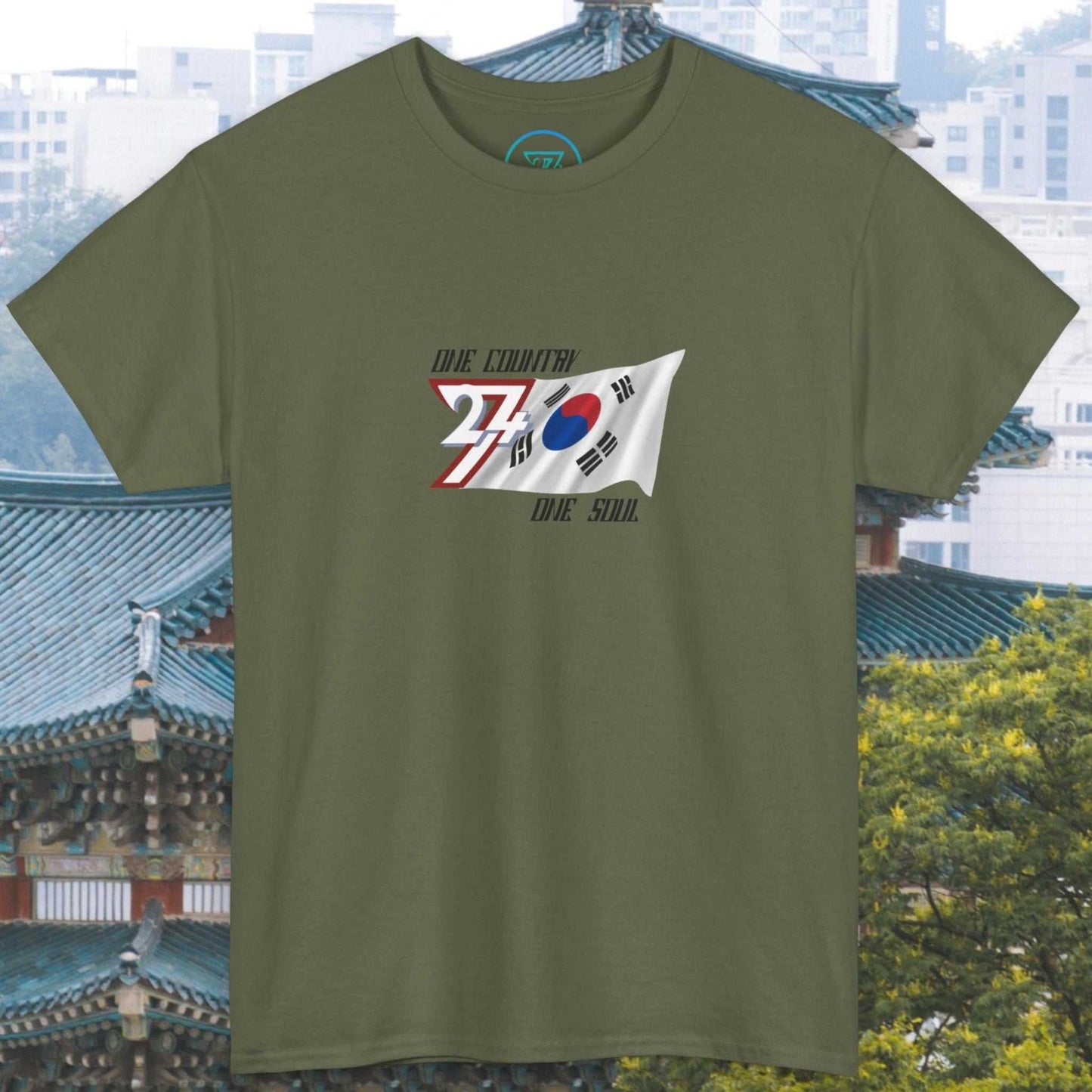 Olive green unisex T-shirt with hand-drawn South Korea flag graphic and "One Country One Seoul" text design
