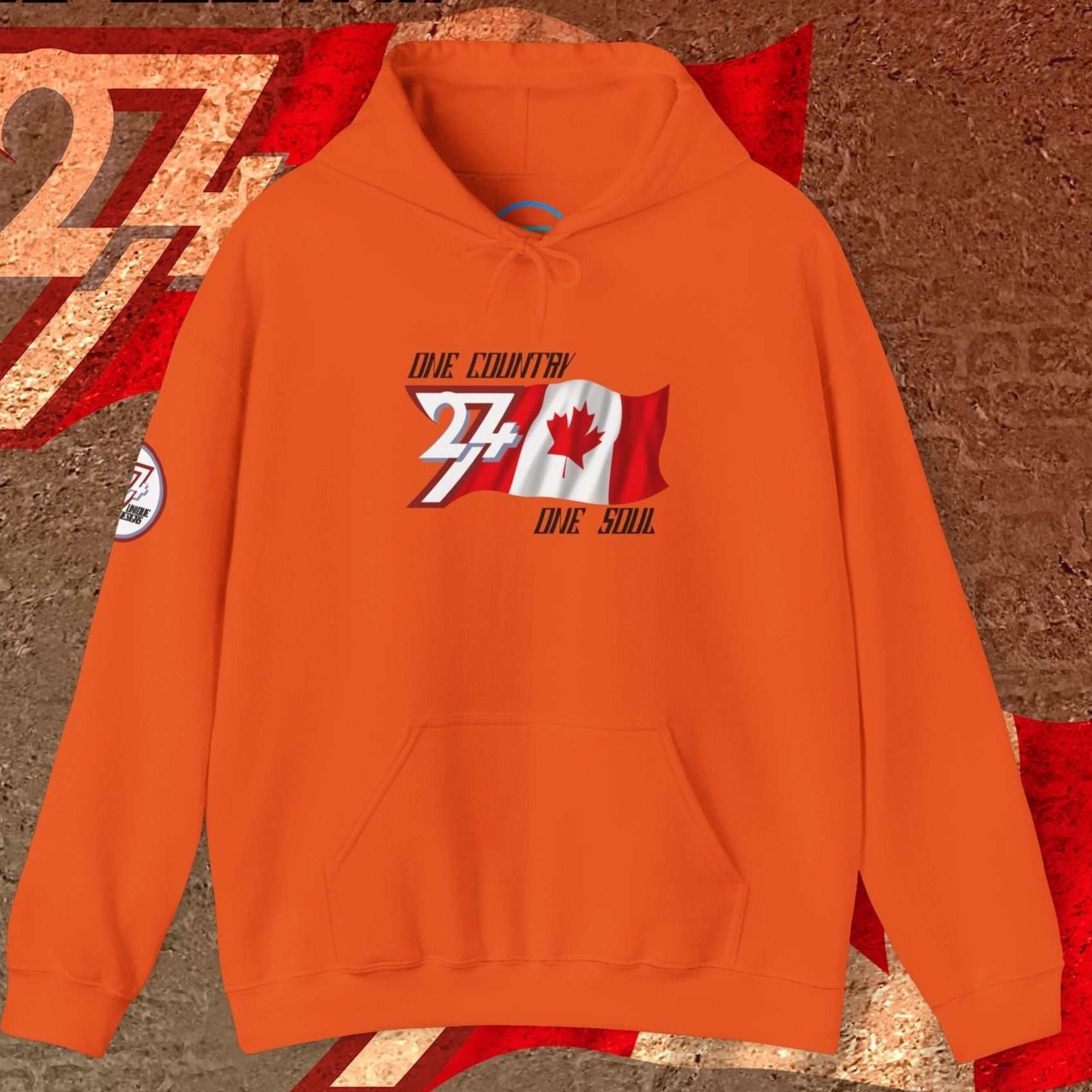 Orange lifestyle hoodie showcasing 24/7 passion for Canada with refined "Atelier" art.