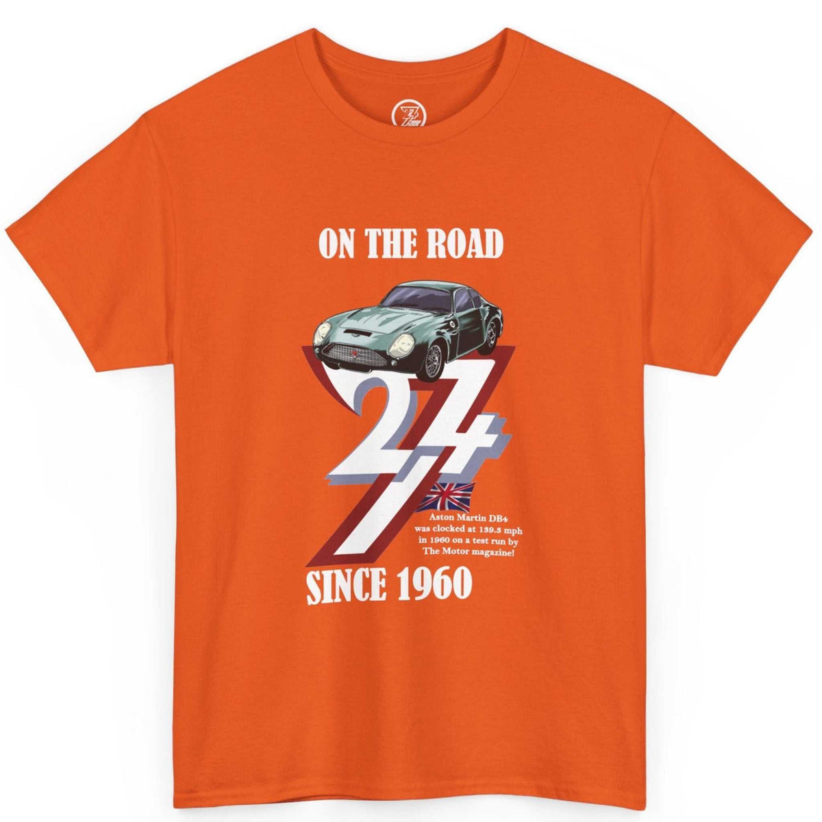 Front view of a vibrant orange classic car guy gift tee showcasing the full-color vintage Aston Martin graphic, laid flat.