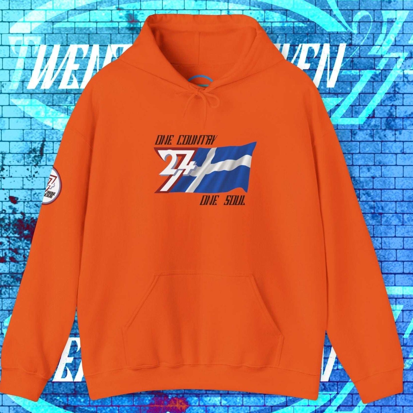 Vibrant Orange lifestyle hoodie showcasing the 24/7 passion for Suomi with refined "Atelier" graphics.