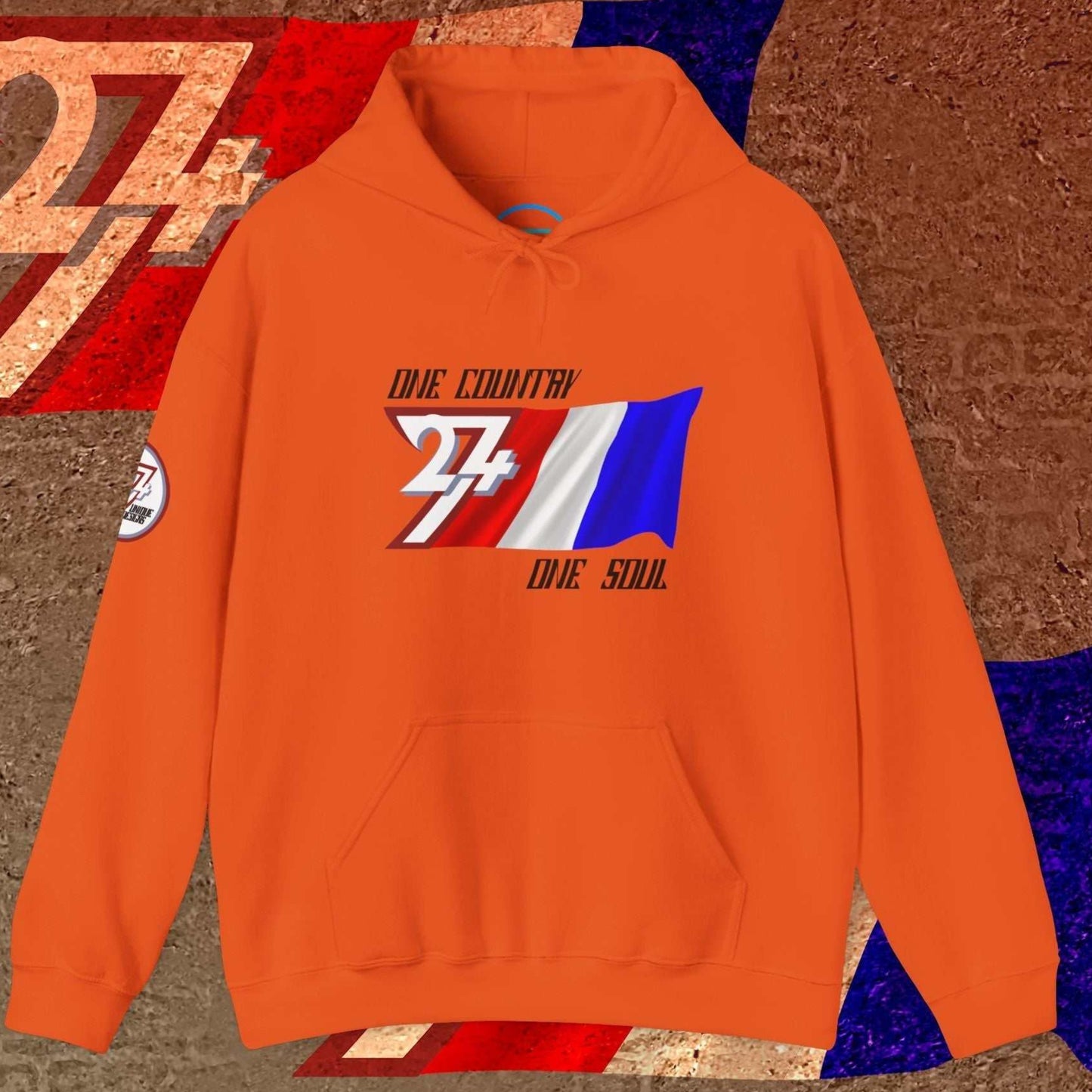 Vibrant Orange lifestyle hoodie showcasing the 24/7 passion for France with refined "Atelier" graphics.
