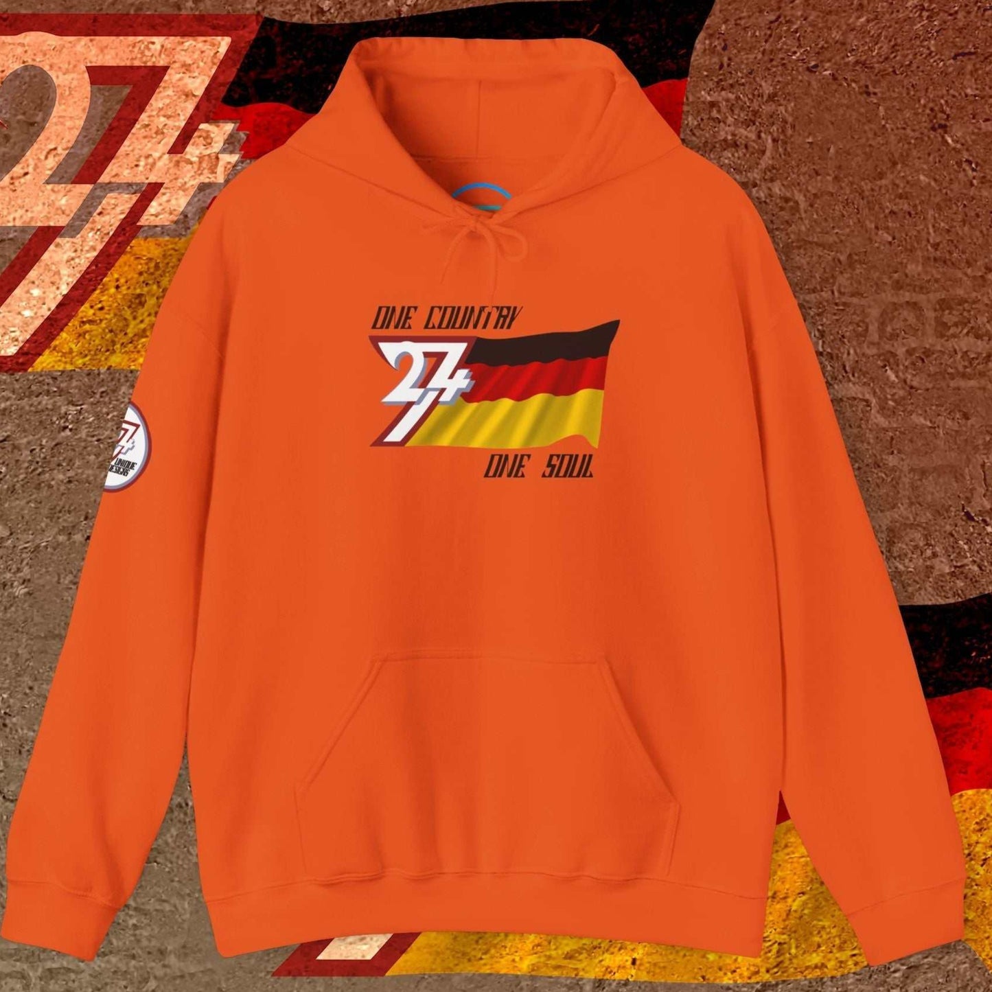 Vibrant Orange lifestyle hoodie showcasing the "Axis" edition German flag art and premium branding.
