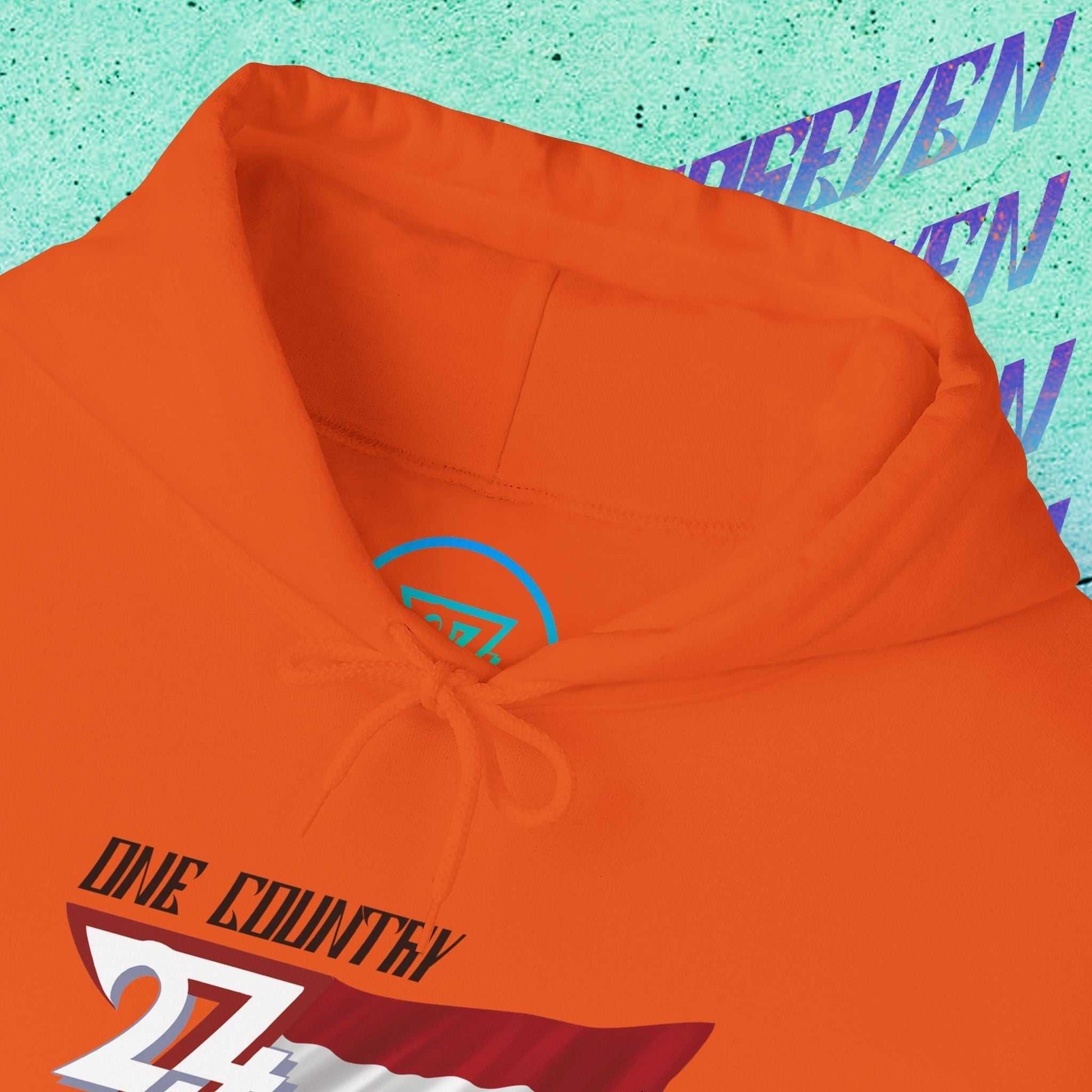 Macro close-up of the inner neck area showing the tear-away label and authentic 24/7 Unique Designs trademark logo.