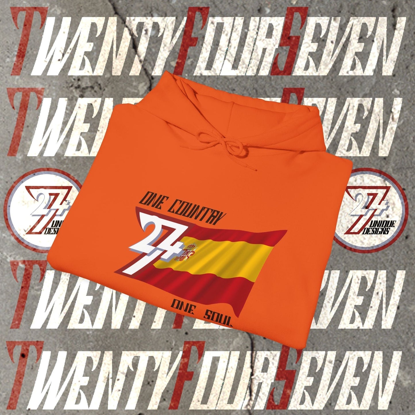 A professional display of the España flag hoodie in Orange, folded to showcase the refined hand-drawn graphic and 8oz fabric weight.