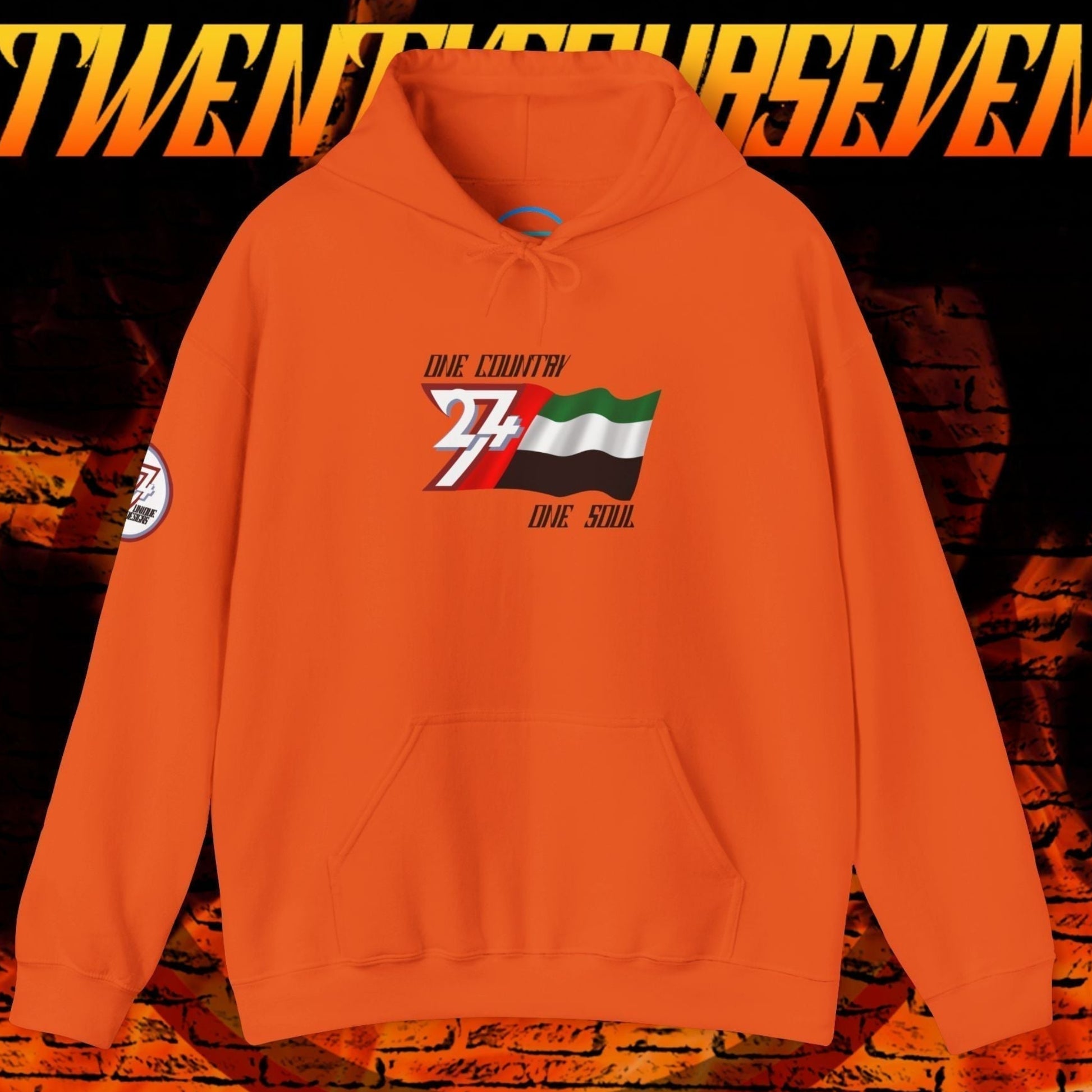 Vibrant Orange UAE flag graphic hoodie showing the refined hand-drawn design and slogan.