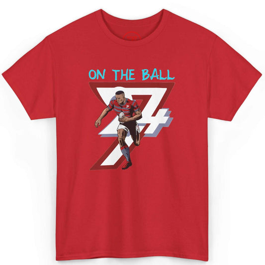 Front view of a bold red comic-style rugby graphic tee featuring the hand-drawn player illustration, displayed on a clean background.