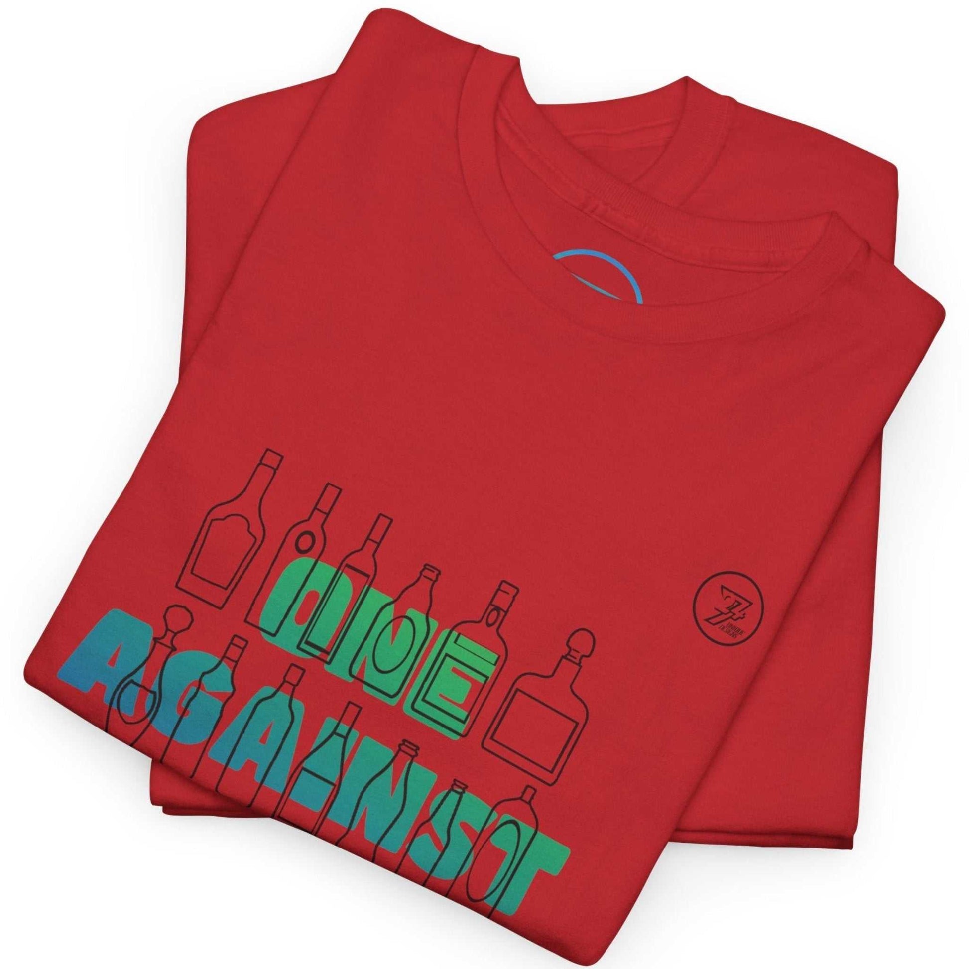 Neatly folded red summer party tee showing the premium heavy cotton fabric and a glimpse of the blue-green gradient text, laid flat.
