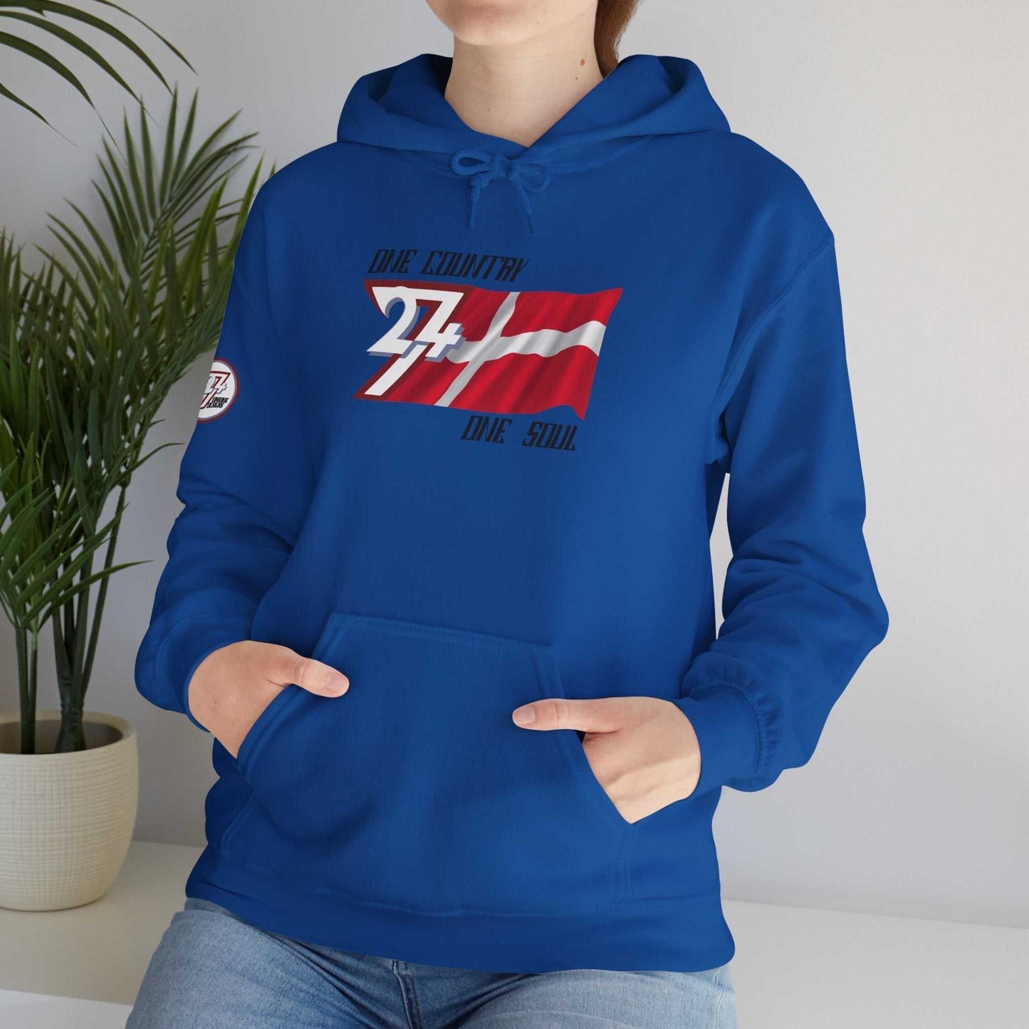 Female model wearing the Danmark "Legend" hoodie in Charcoal, styled for a modern streetwear look.
