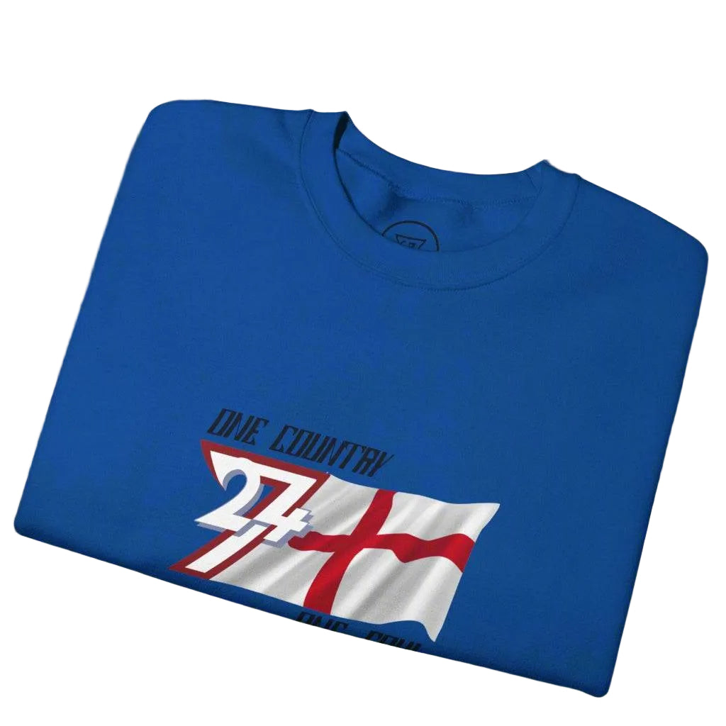 Blue England sweatshirt with unique England flag and "One Country One Soul" slogan design, folded outdoors.