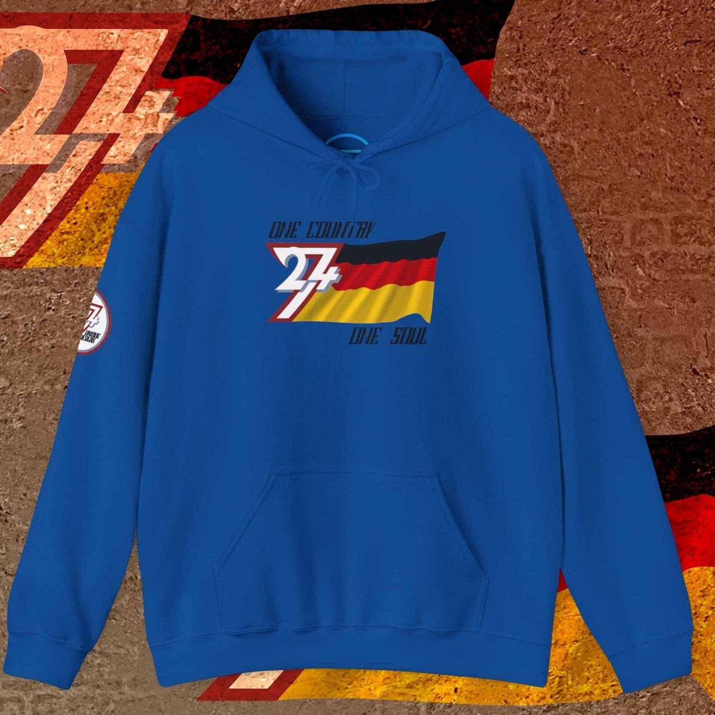A rich Royal Blue streetwear hoodie displaying the refined German flag illustration and 24/7 brand details.