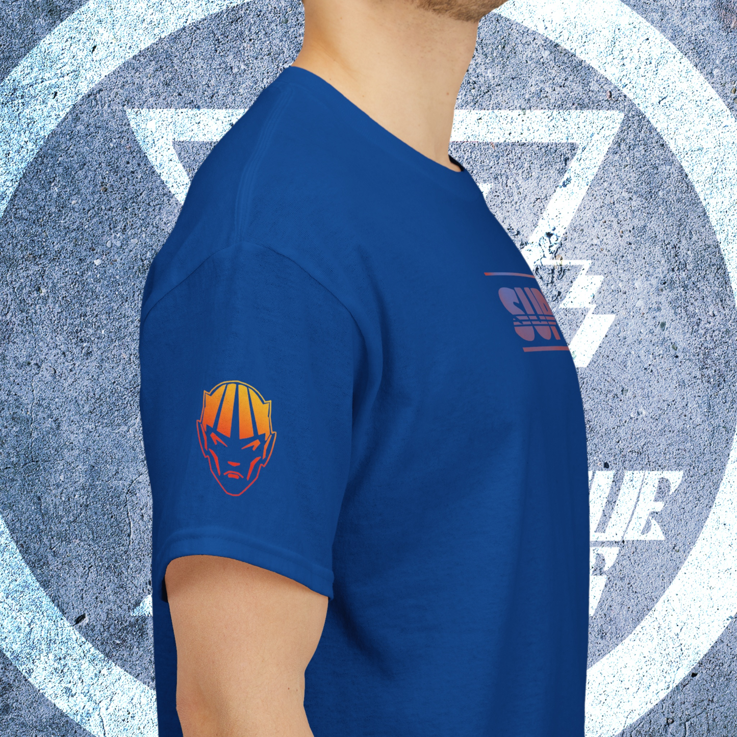 Zoomed in view of the comic character sleeve print on the royal blue premium t-shirt.