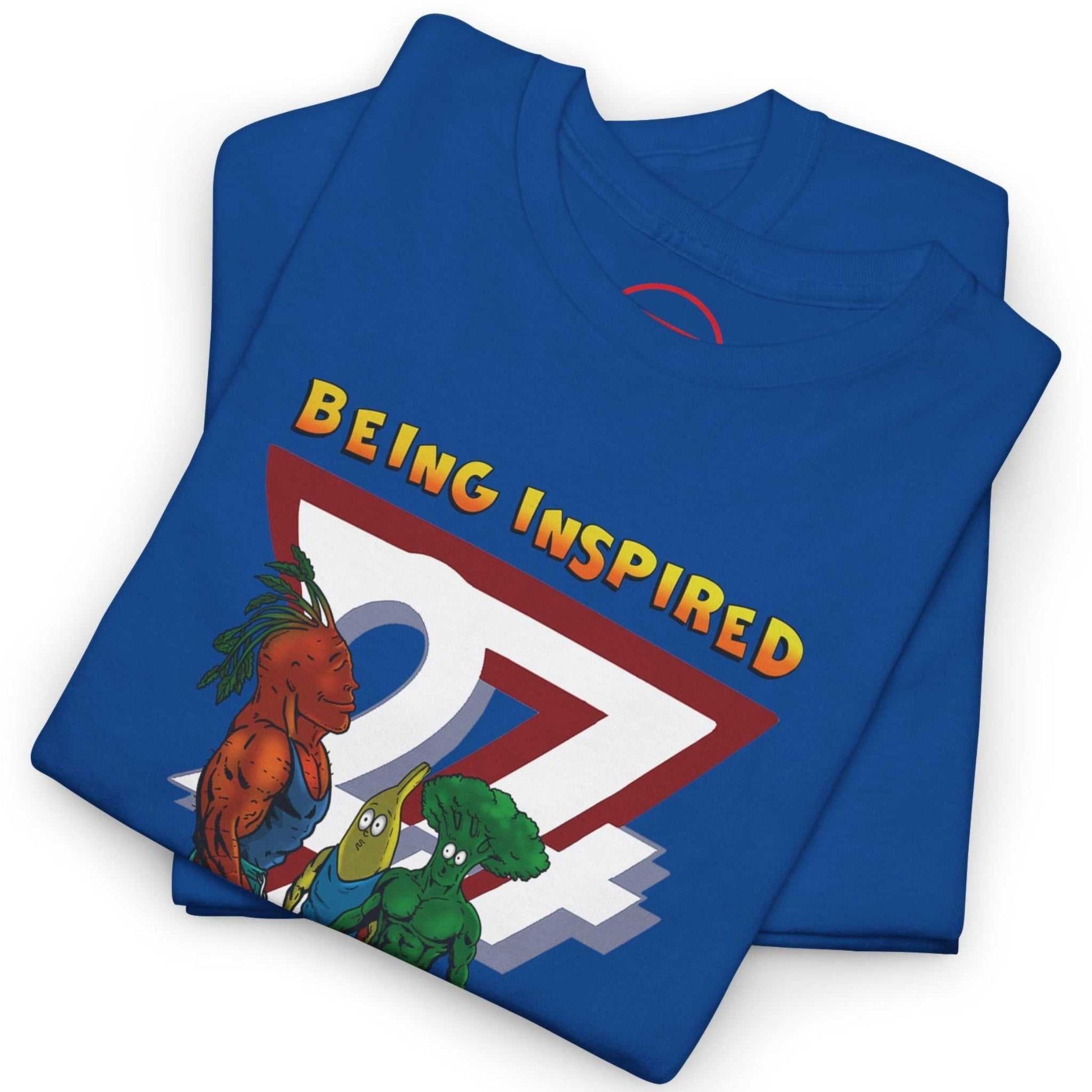 Neatly folded royal blue cartoon fitness shirt showing the crisp front illustration and premium cotton fabric, laid flat.