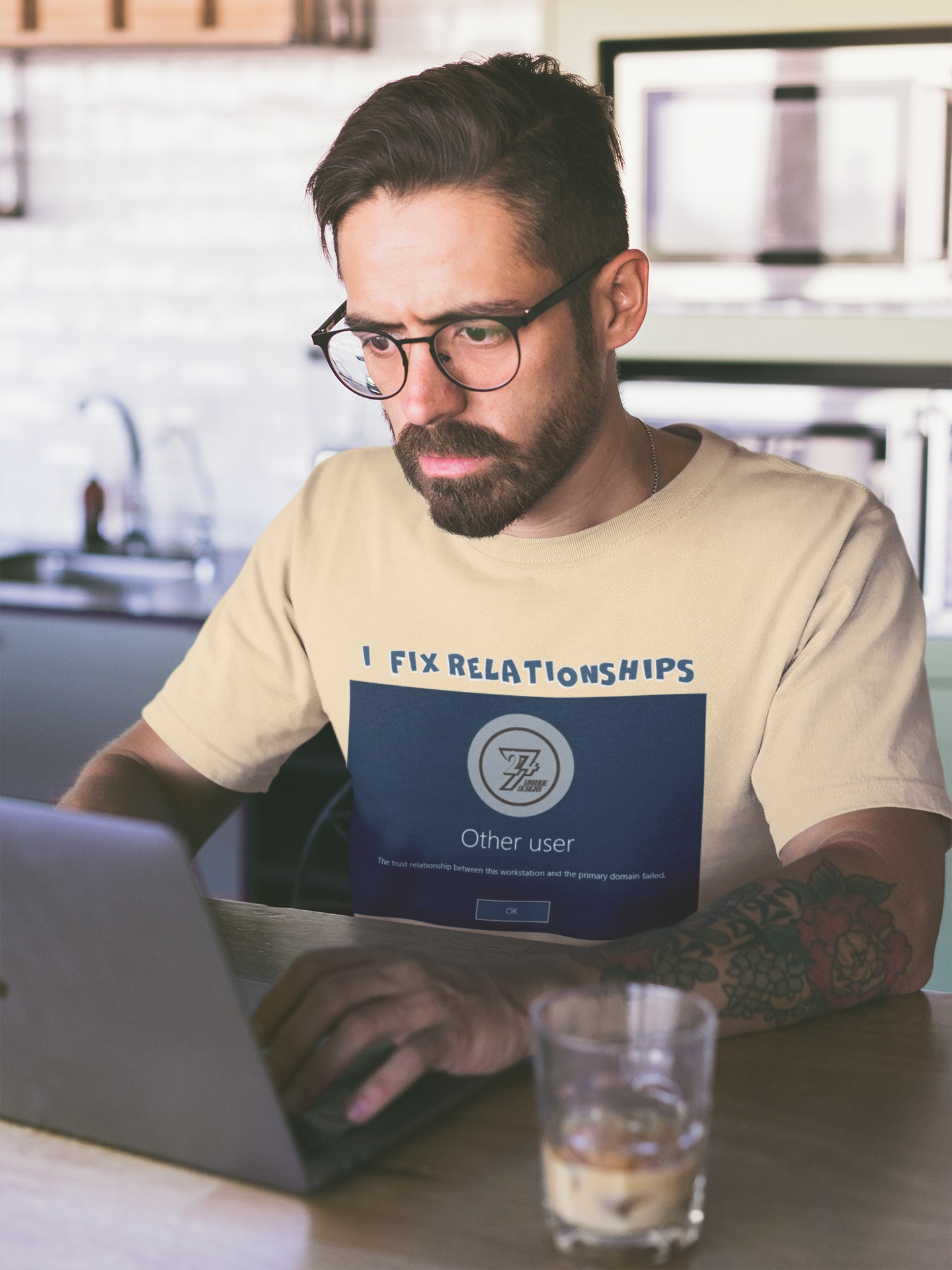 Sand colored everyday wear top highlighting the I fix relationships double meaning design for tech workers.