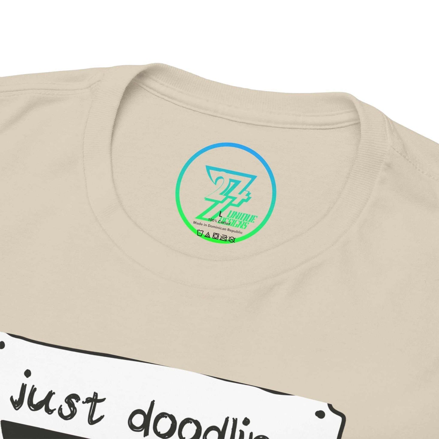 Close-up of the timeless crew neckline on the sand beige funny cartoon scooter shirt, highlighting the neat construction and 24/7 logo internal label.