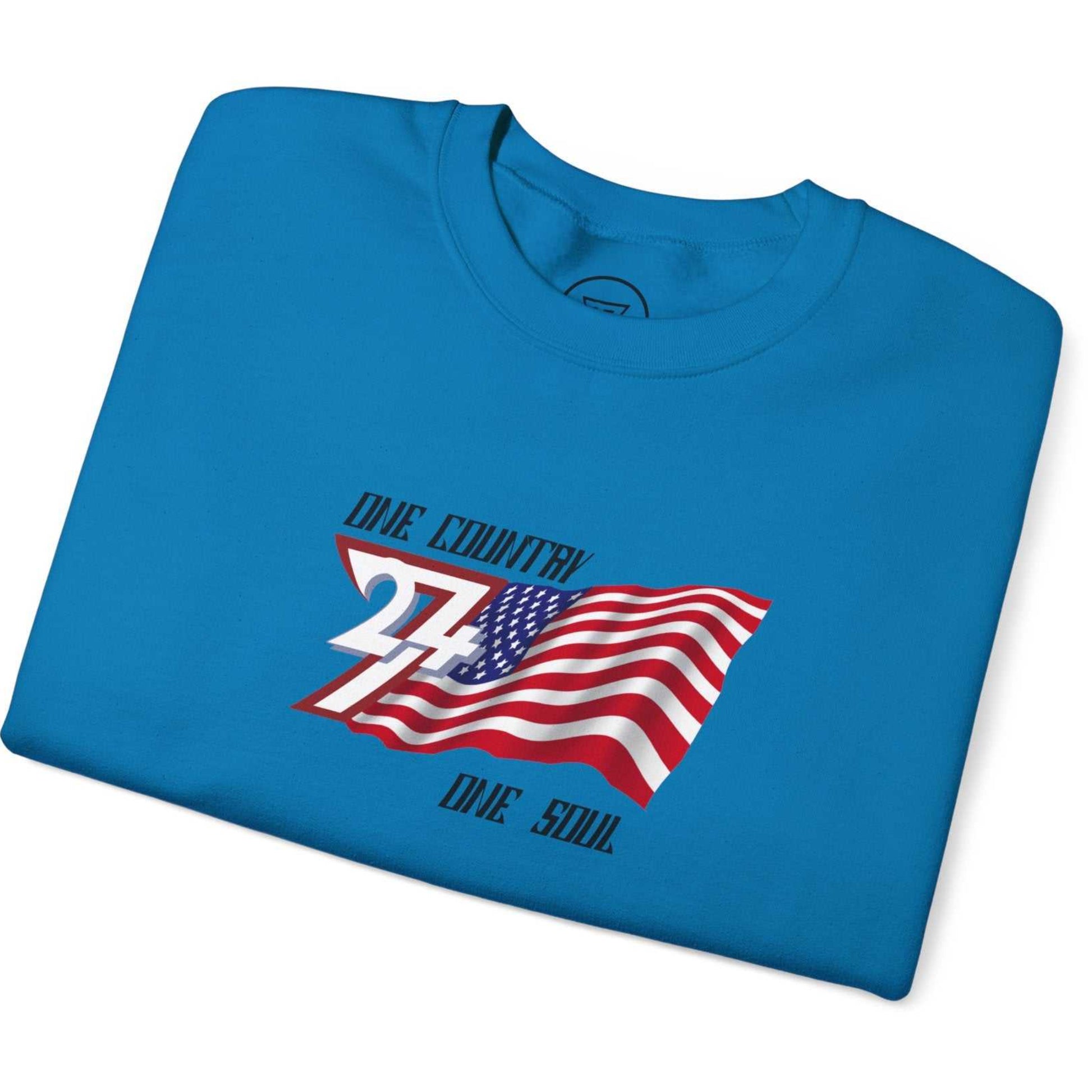 Folded sapphire sweatshirt with American flag graphic and text on a white background