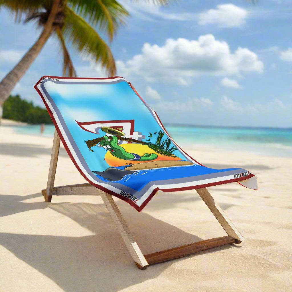 Funny shark beach towel featuring Leonando the cactus hanging from a palm tree above a shark.