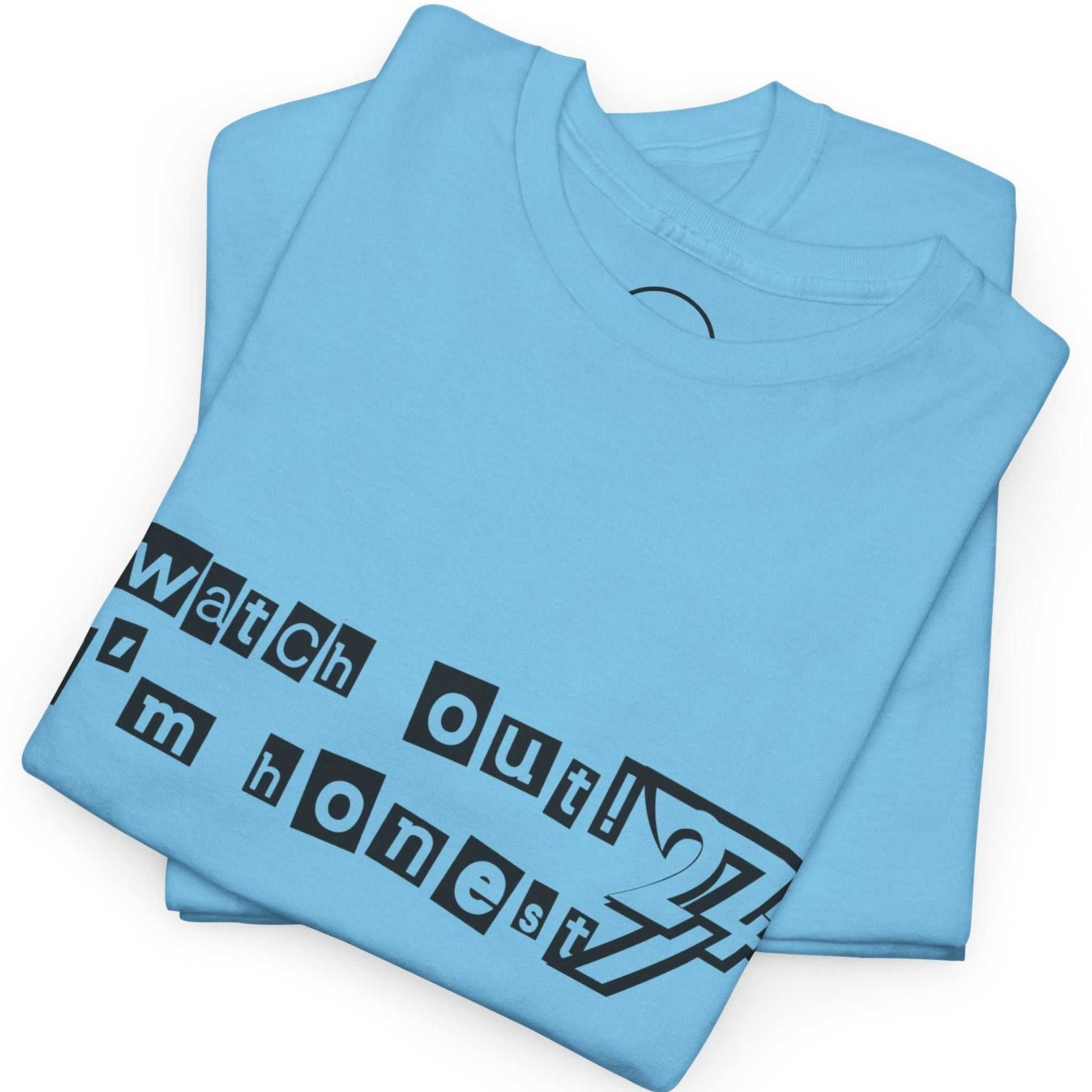 Neatly folded sky blue funny honest slogan tee showing the heavy cotton fabric and printed text.
