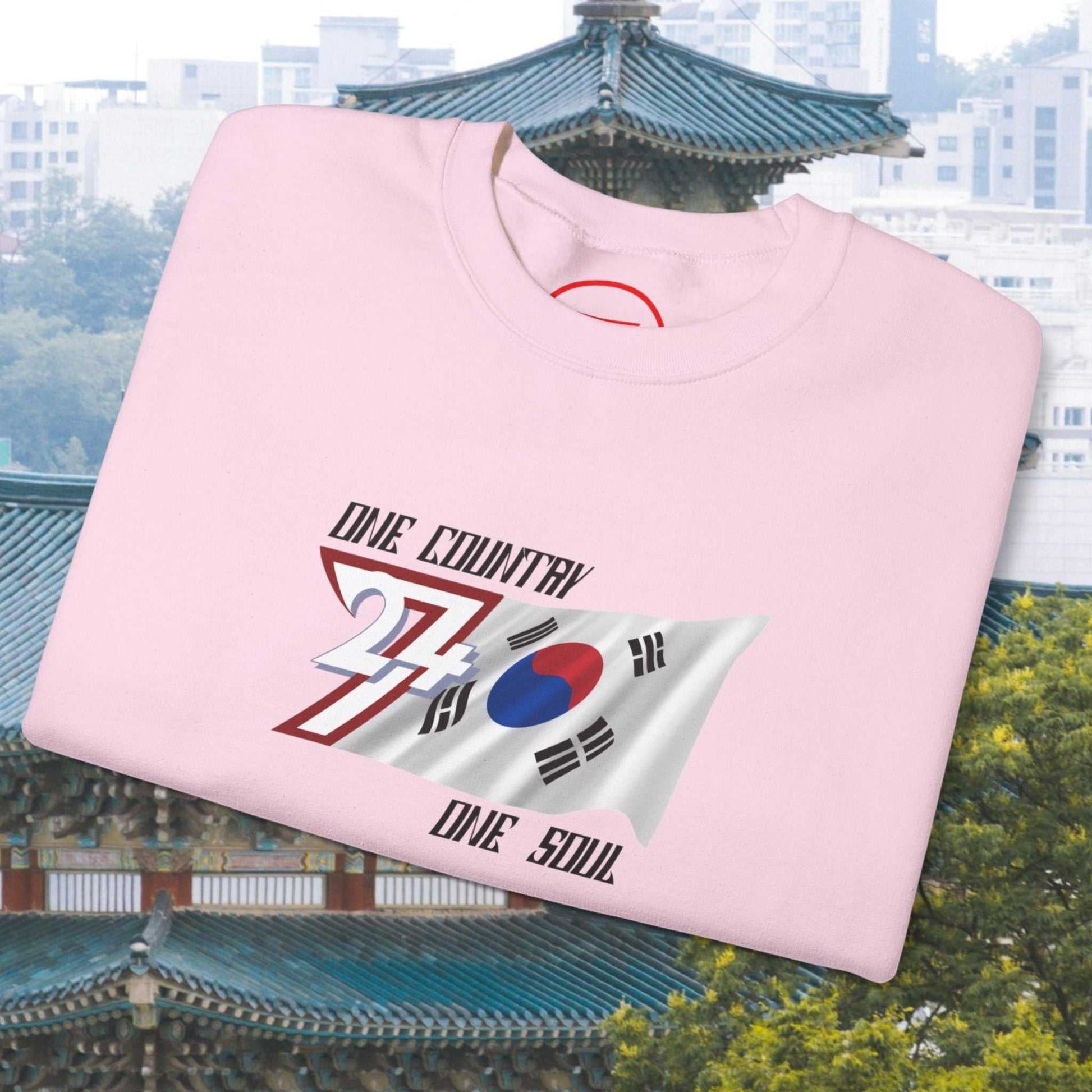 Pink South Korean flag sweatshirt with hand-drawn Korean graphic and "One Country One Soul" text on chest