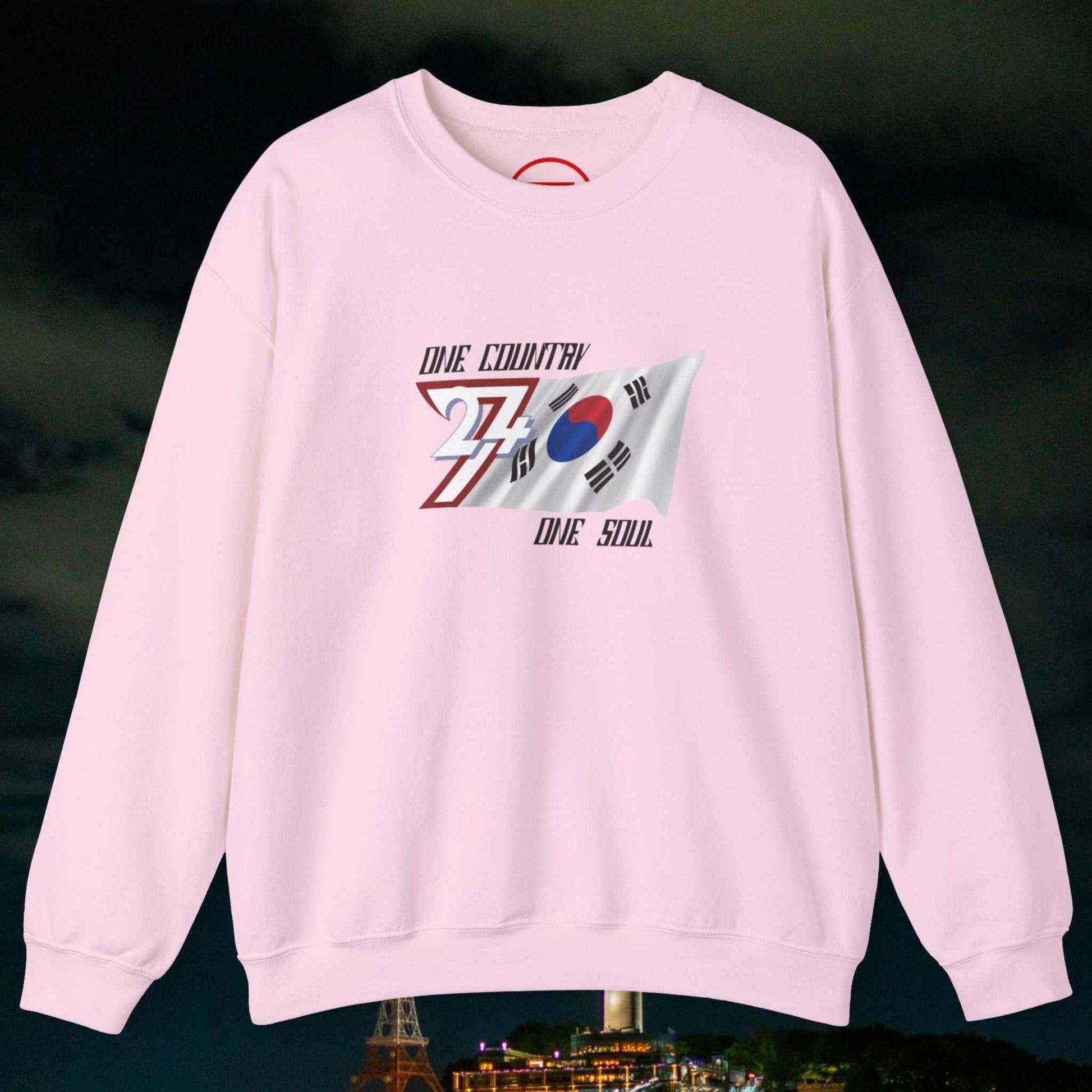 Pink crewneck sweatshirt with hand-drawn South Korean flag graphic and "One Country One Soul" text on chest