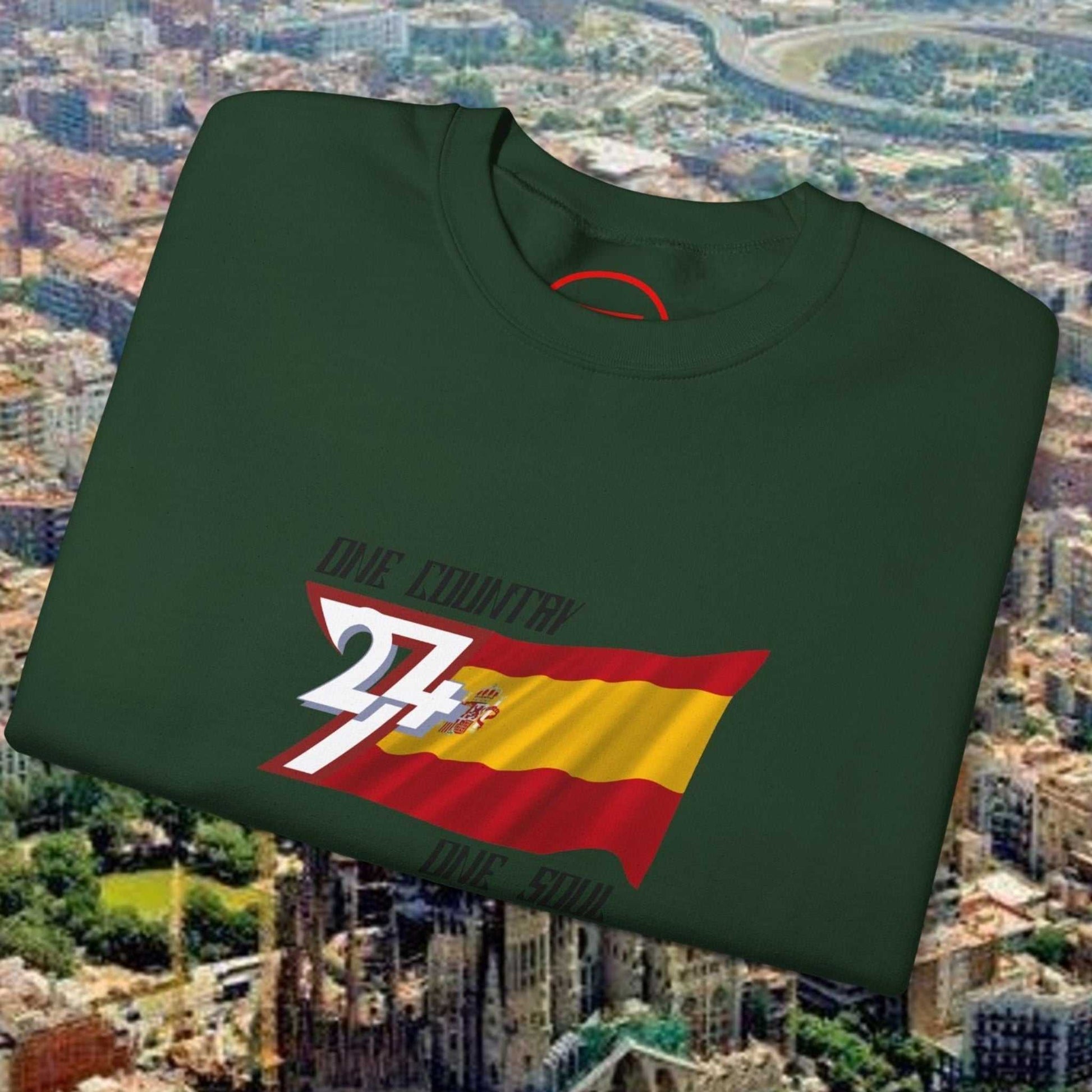 Green crewneck sweatshirt featuring a hand-drawn Spain flag graphic, casual and sporty design.