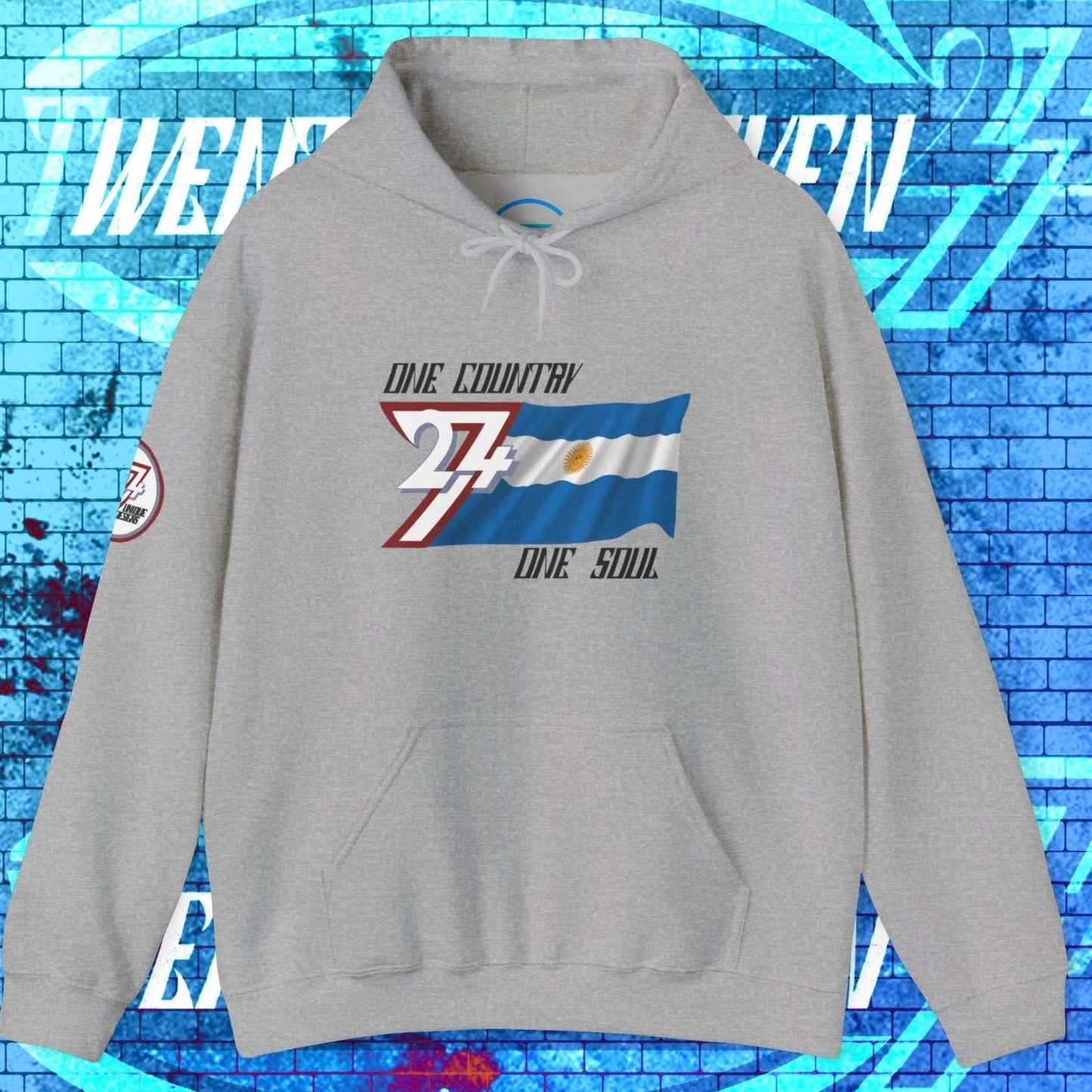 Sport Gray Argentina flag hoodie showing high-contrast "Atelier" graphic and premium 8oz texture.