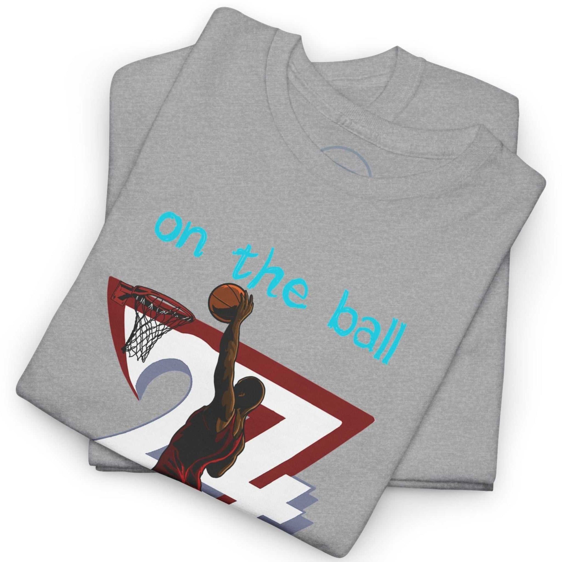 Neatly folded sport gray streetball clothing tee highlighting the crisp digital front print and soft fabric, laid flat.