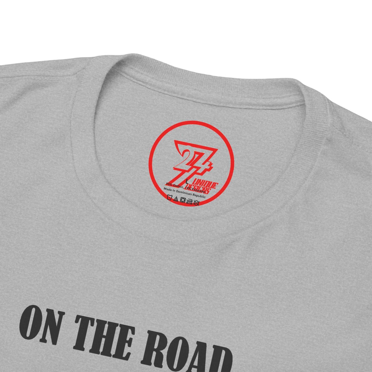 Close-up of the ribbed knit collar on the sport gray vintage Ferrari shirt, clearly showing the official 24/7 Unique Designs trademark logo inner label.