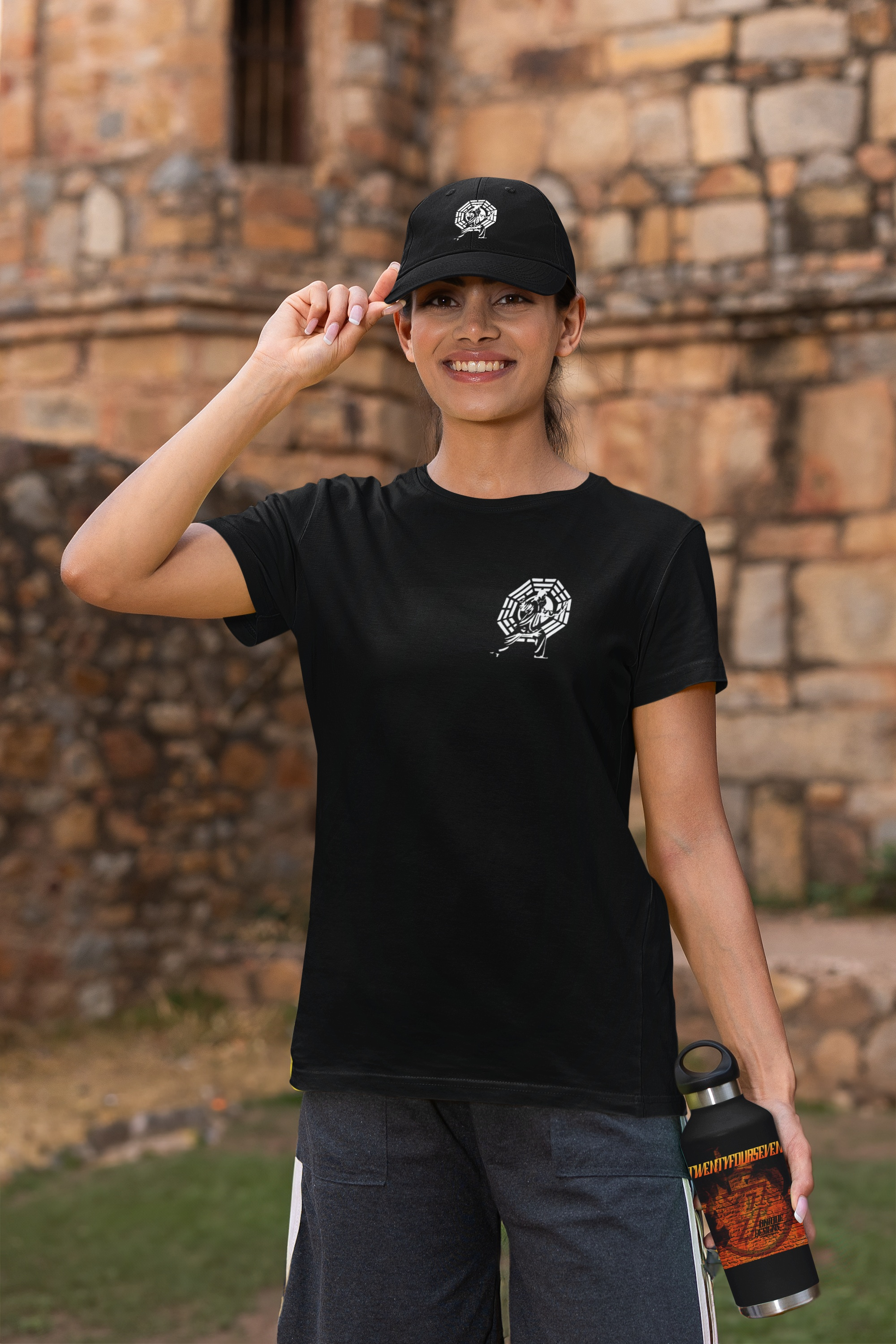 Black Tai Chi baseball hat on female model