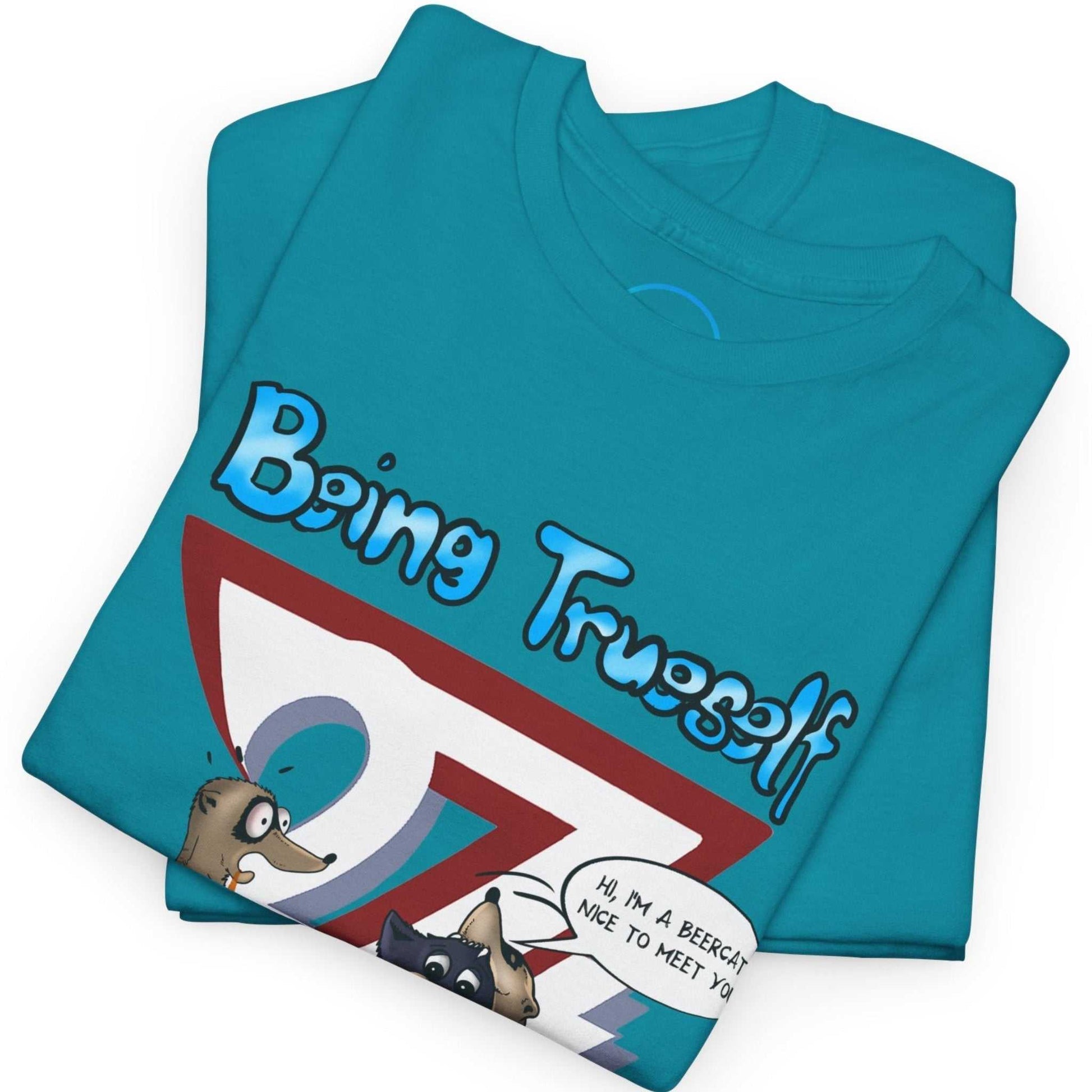 Neatly folded teal funny cat and meerkat tee showing the premium cotton fabric and part of the vibrant cartoon print, laid flat.