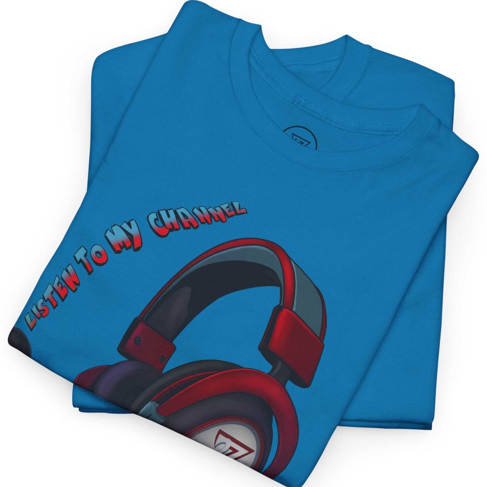 Neatly folded vivid blue gamer headset streamer shirt showing the premium cotton fabric and part of the vibrant red headset print, laid flat.