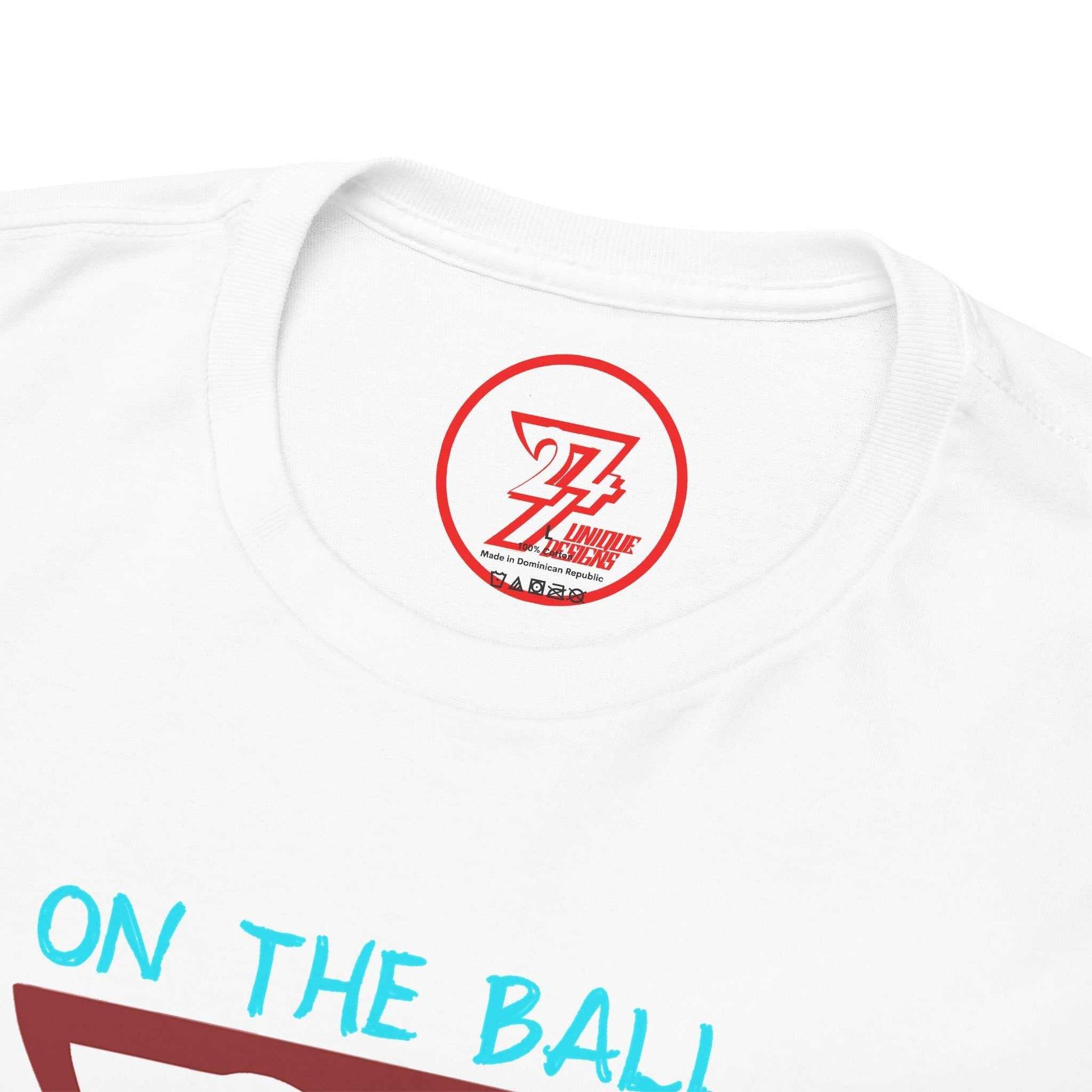 Close-up of the seamless crew neckline on the white ping pong shirt, clearly showing the official 24/7 Unique Designs trademark logo inner label branding.