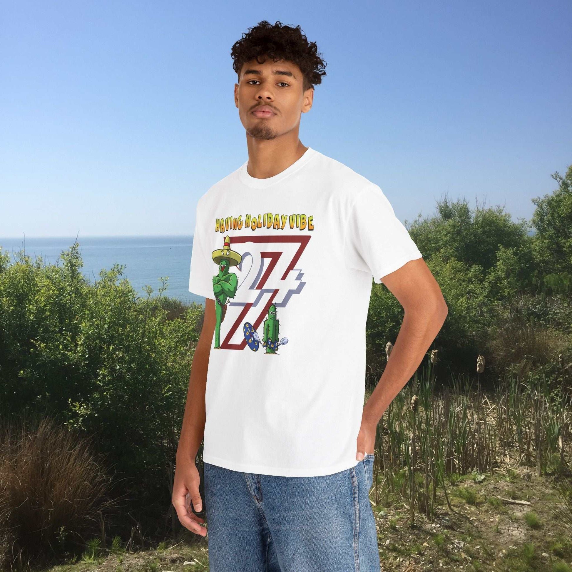 Man wearing a crisp white funny family vacation graphic t-shirt featuring a father-son cactus joke.