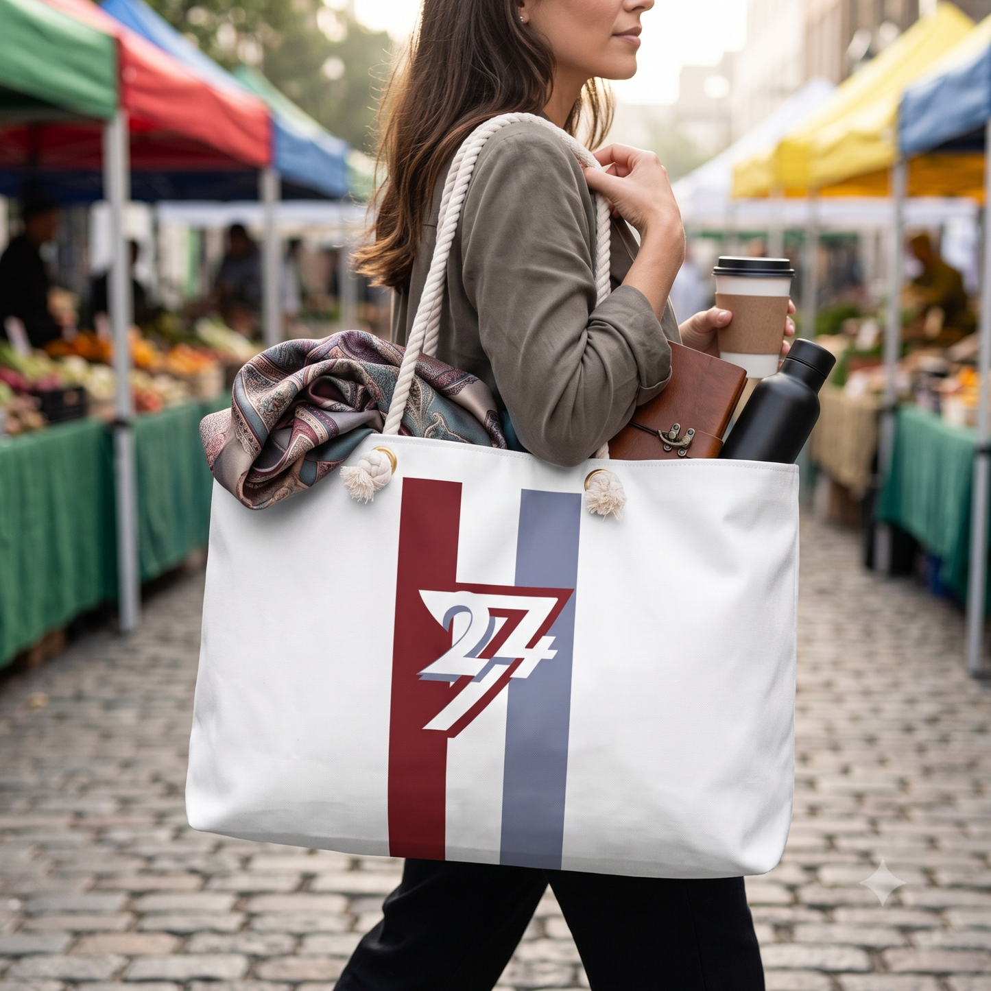 Woman walking through a bustling outdoor market carrying the oversized weekender tote bag by 24/7 Unique Designs, showcasing its massive storage capacity as it easily holds a water bottle, journal, and scarf.