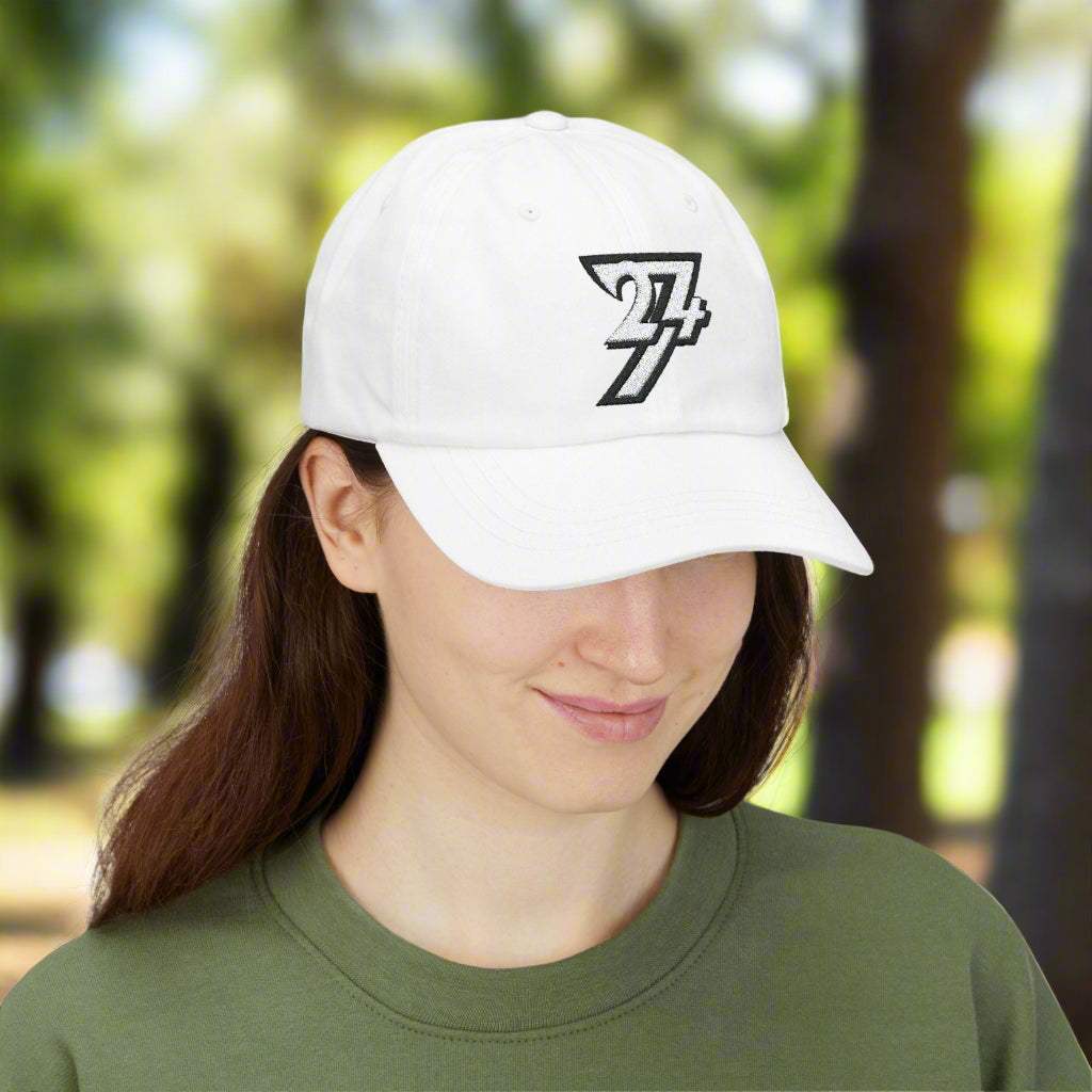 Woman wearing the white 24/7 logo embroidered hat by 24/7 Unique Designs